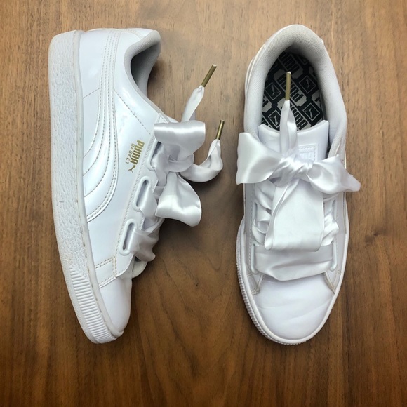 white patent leather pumas